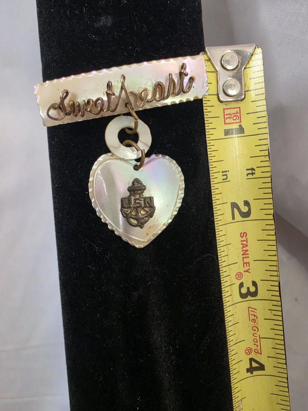 Vintage World War II-era U.S. Navy sweetheart brooch, made from carved MOP